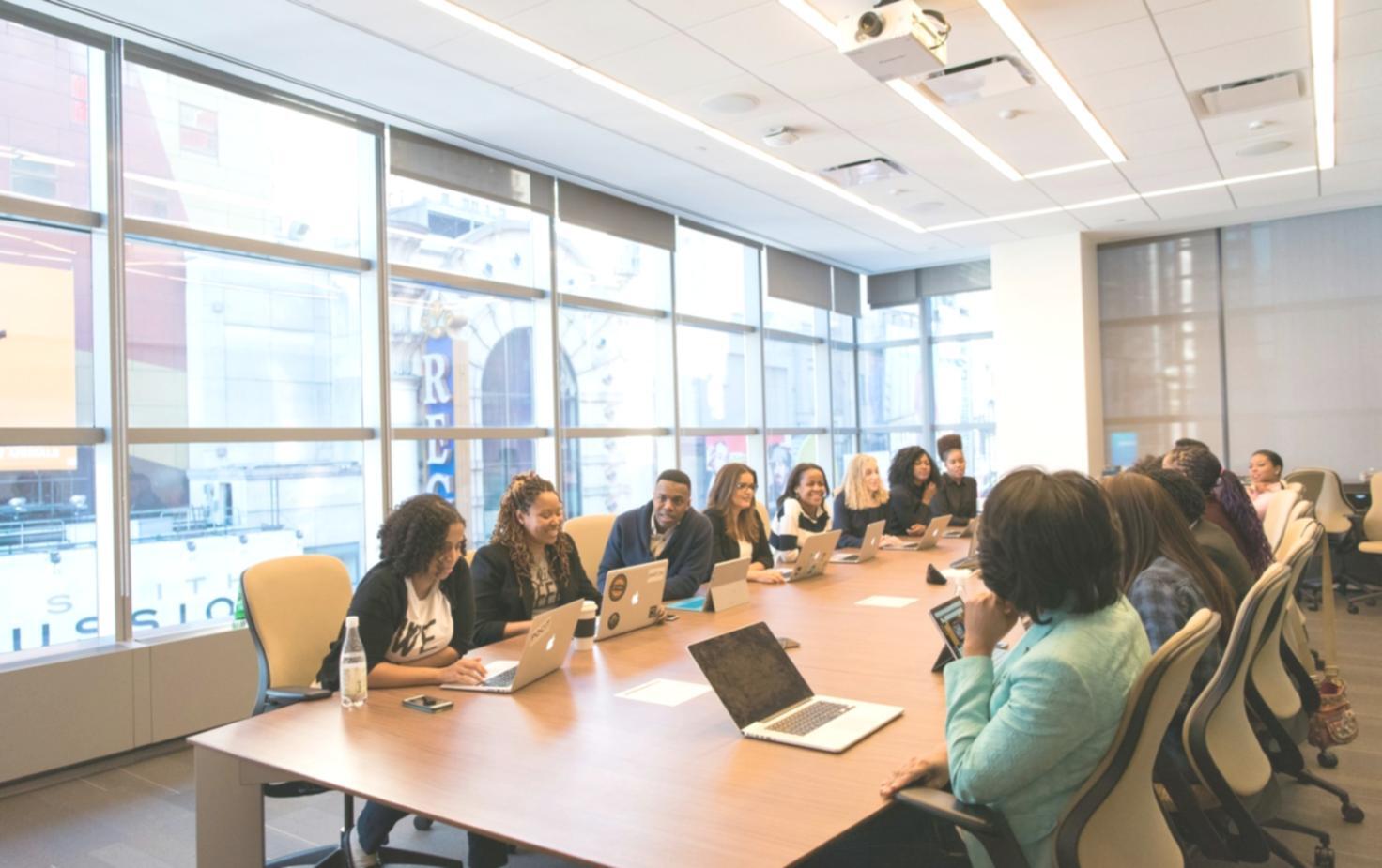 AI development team reviewing insurance document processing algorithms